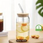 Glass bottle with straw